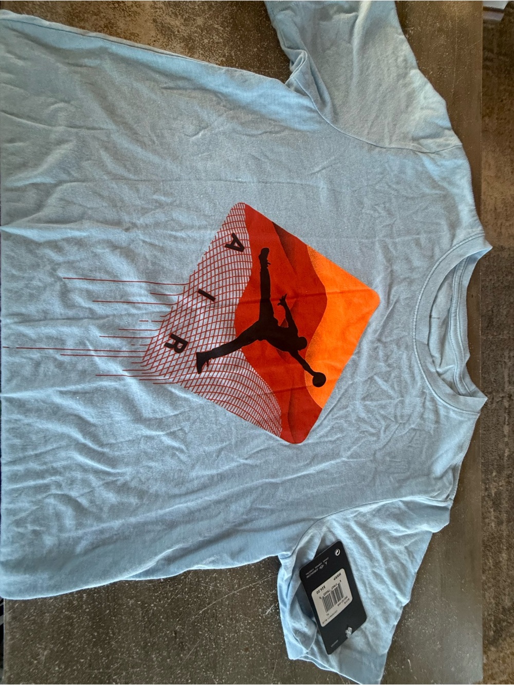 Jordan Light Blue Short Sleeve Tee with Orange and Black Graphic